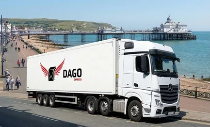 DAGO Express courier service truck in front of Eastbourne Pier and the Victorian seafront in Eastbourne