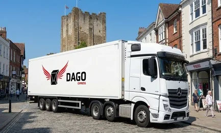 DAGO Express courier service truck in front of Guildford Cathedral on Stag Hill in Guildford