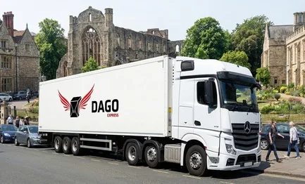 DAGO Express courier service truck in front of Reading Abbey ruins and the River Thames in Reading