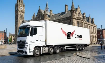 DAGO Express courier service truck in front of Rochdale Town Hall gothic clock tower in Rochdale