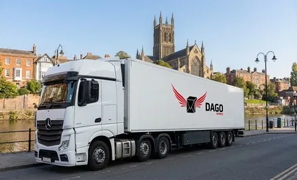 DAGO Express courier service truck in front of Worcester Cathedral beside the River Severn in Worcester